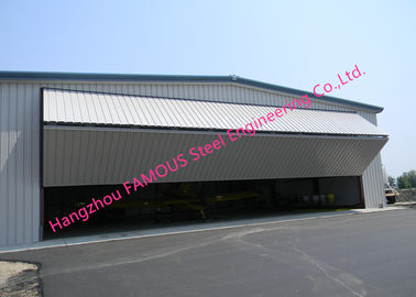 China Dual Panel Hydraulic Hangar Door Upper Folding Industrial Garage Doors With Hard Metal Sandwich Panel supplier
