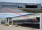 Vertical Bi Fold Hangar Door Solution Light Steel Single Panel Hydraulic Airplane Door System supplier