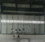 Engineered Unidirectional Aeronautical Hangar Door Typical Design With Wicket supplier