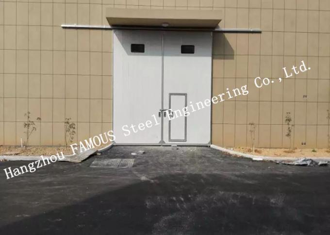 Sectional Horizontal Sliding Industrial Garage Doors With Access Pedestrian Door For Workshop 0